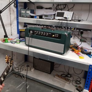 Ben's finished hand-built valve amp head in green tolex with silver grille cloth and black panel style controls